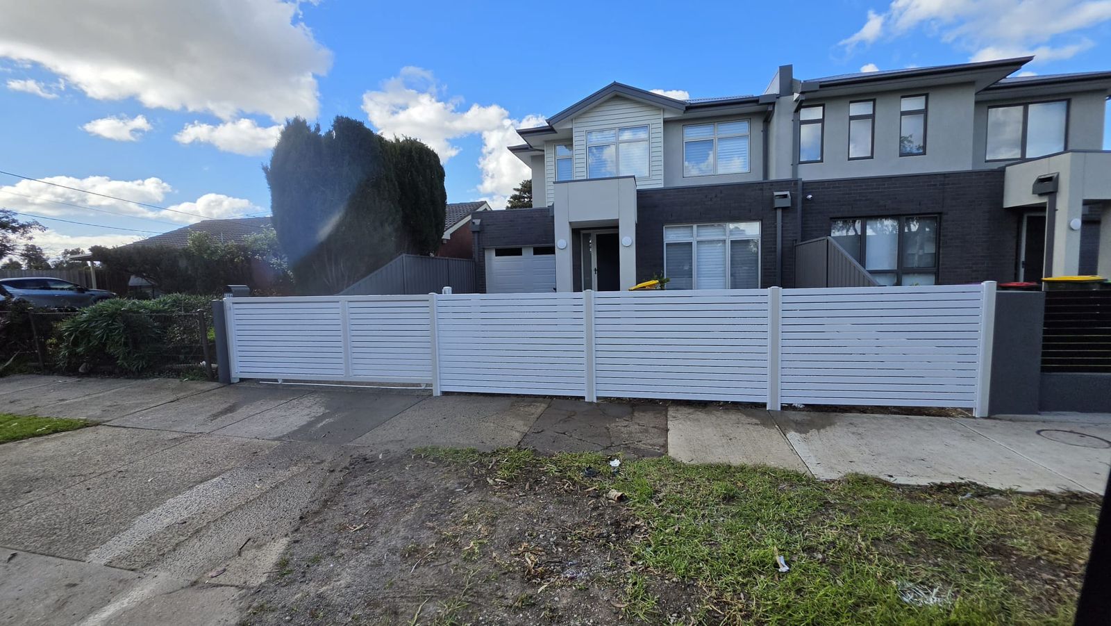 After photo: finished fence and gate install